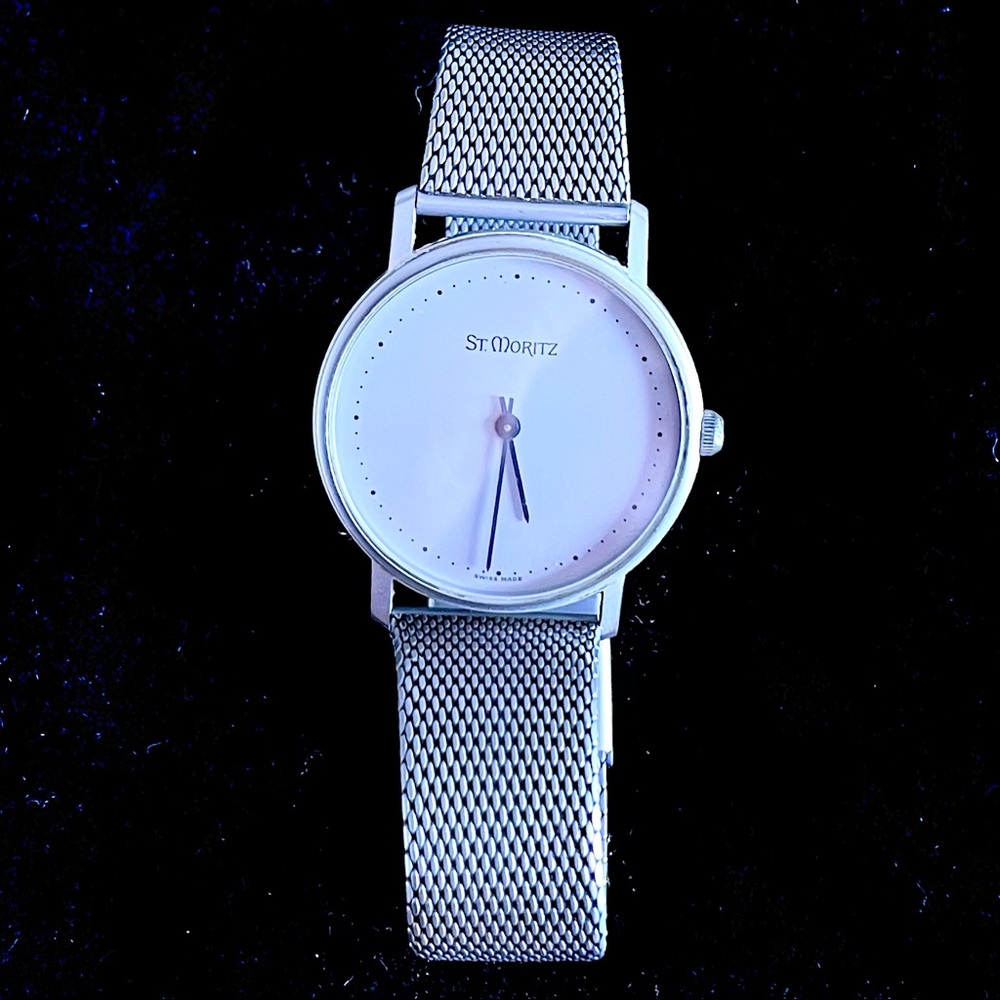 Beautiful St. Moritz matte silver watch with mesh band.